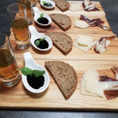 Antipasti - Tomatenessenz- Balsamico di Modena Vinschgauer - Parmigiano Reggiano- Iberico